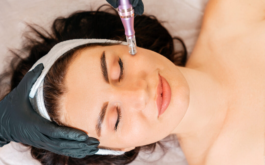 Professional skin care. Beauty treatment of fractional mesotherapy of woman's face.